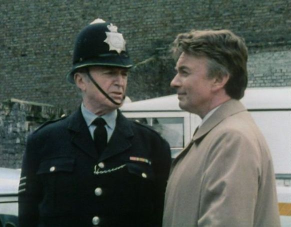 Dixon (Jack Warner) and Crawford (Peter Byrne)