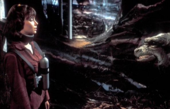 Poor Peri is menaced by an unconvincing rubber monster.  The fate of Doctor Who companions down the ages.